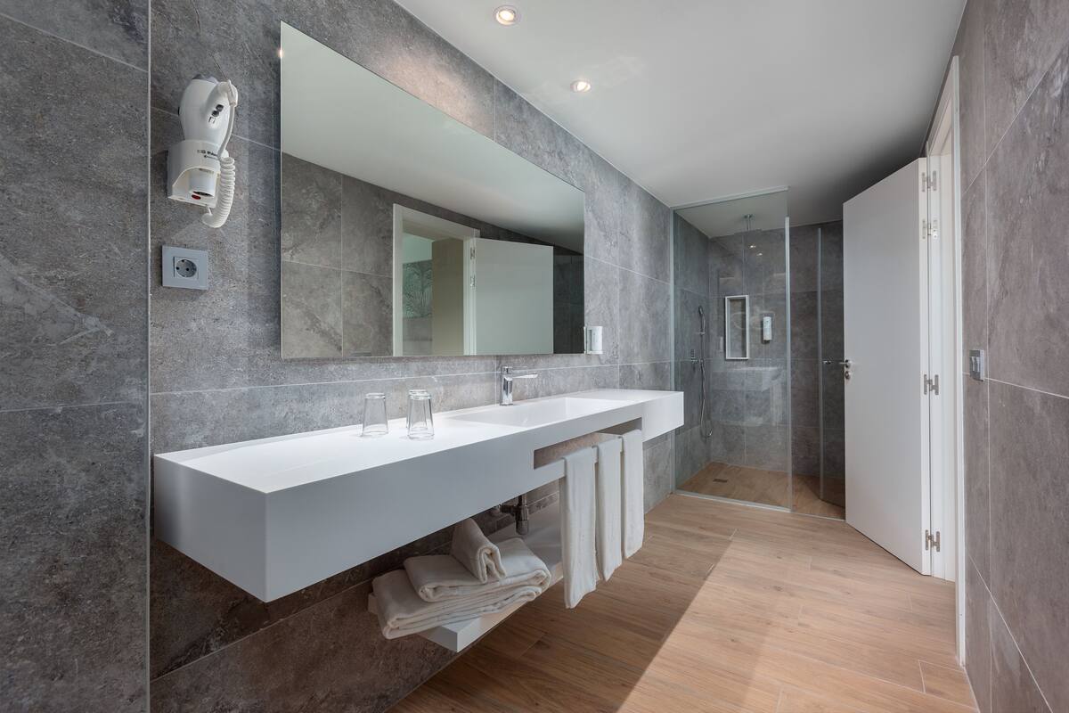 family double room, terrace, pool view | bathroom | shower, rainfall showerhead, free toiletries, hair dryer