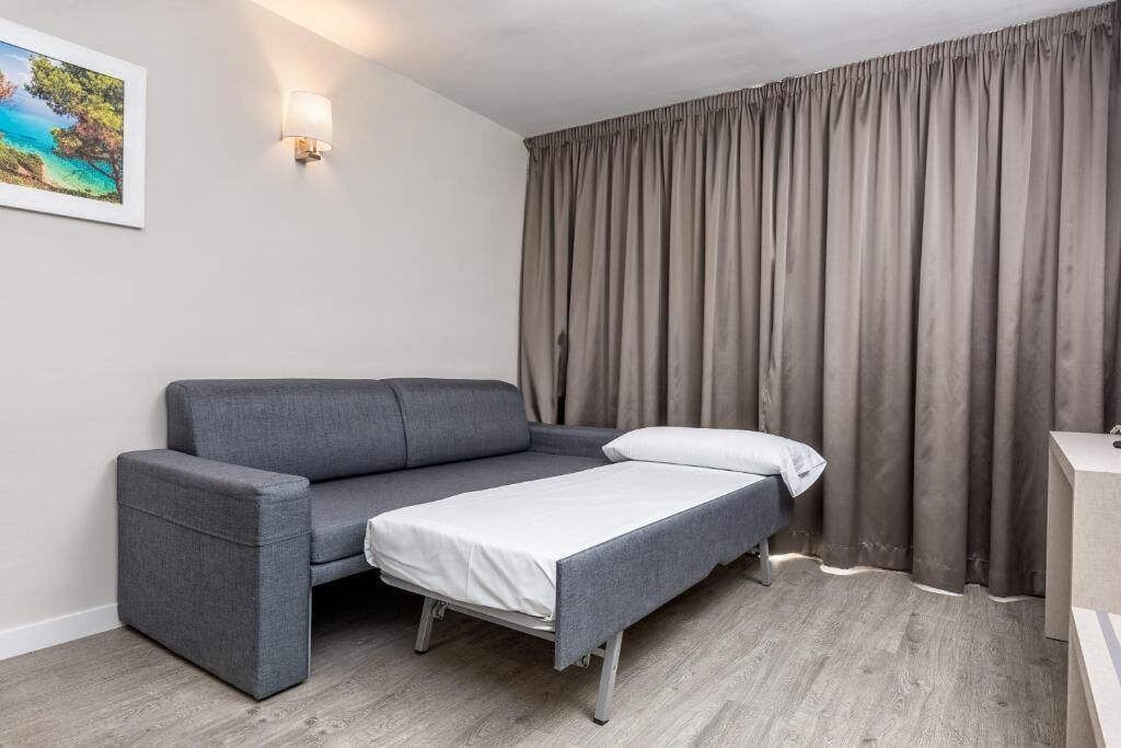 Blackout curtains, iron/ironing board, free WiFi, bed sheets