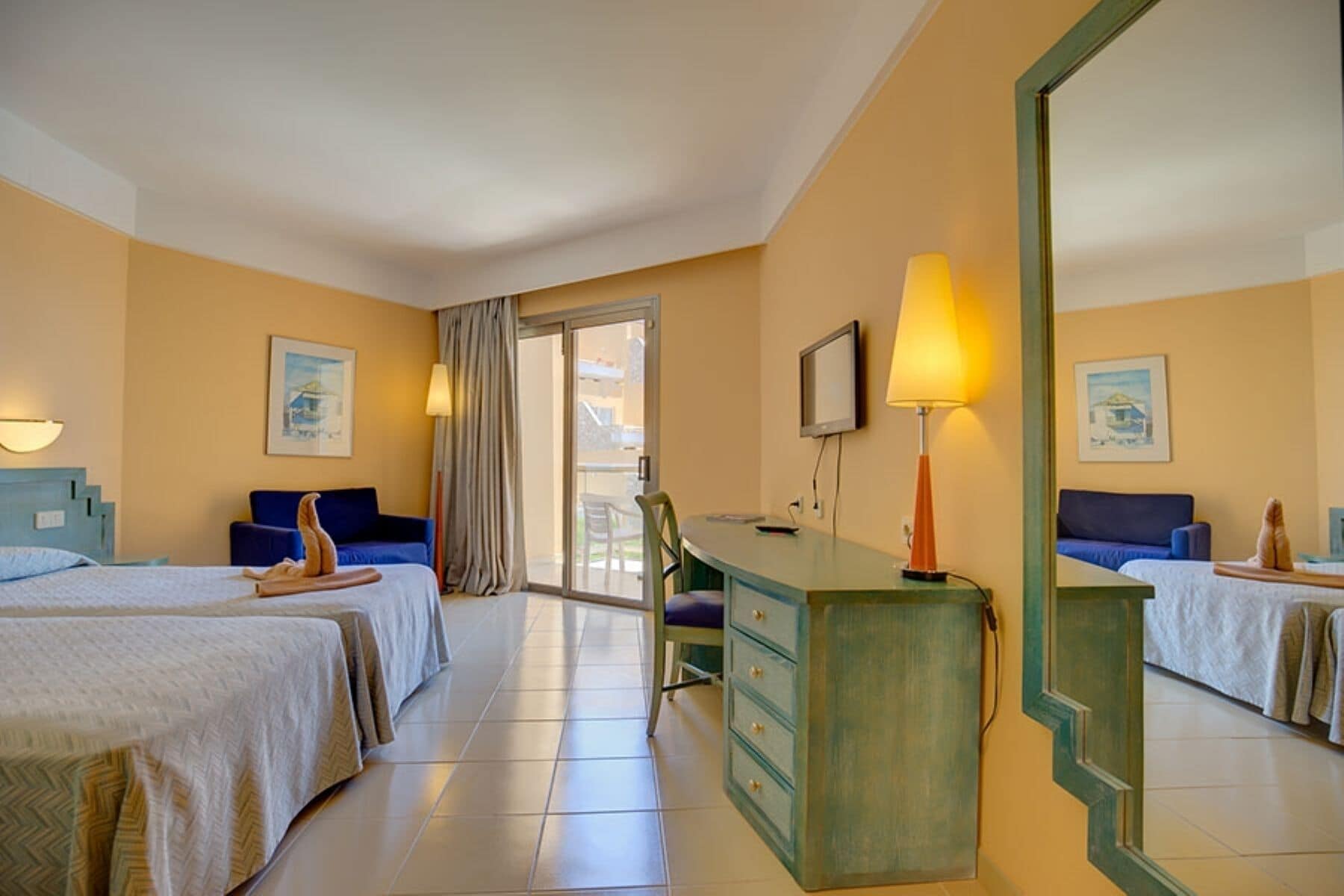 Desk, blackout drapes, bed sheets