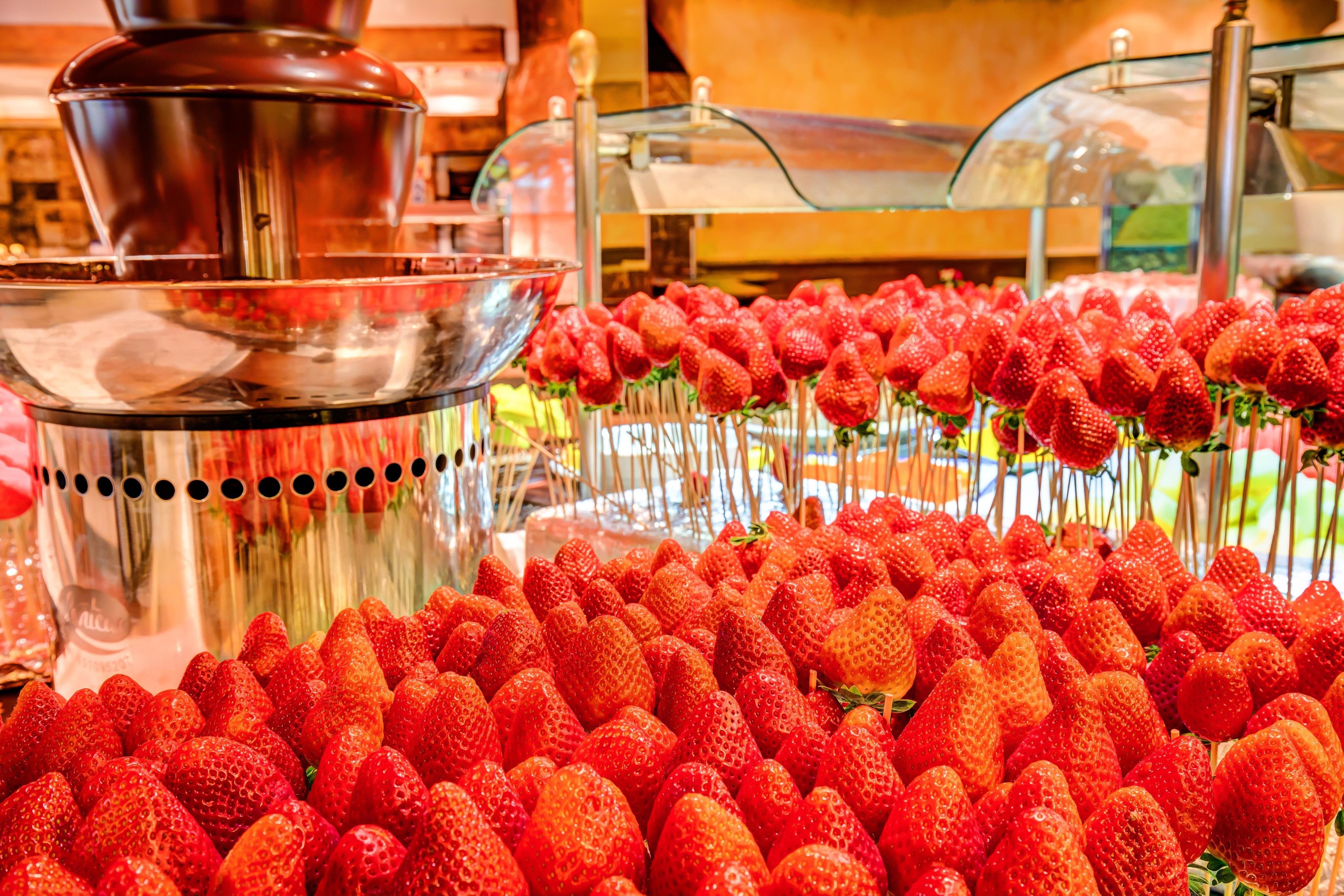 A buffet with a large selection of strawberries.