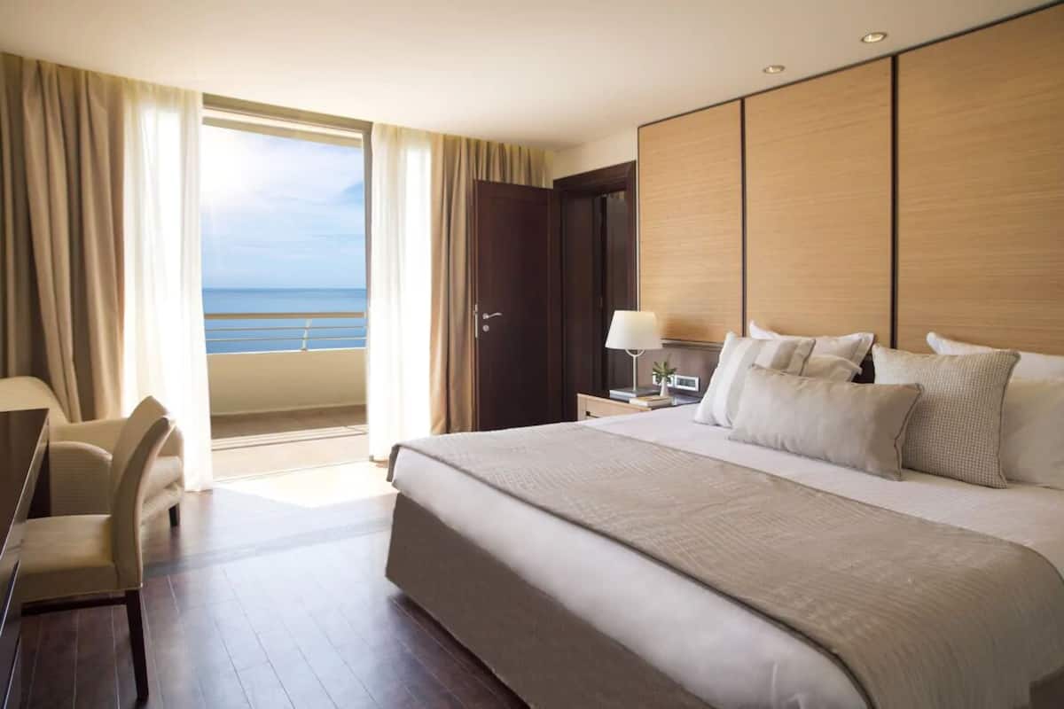 Suite, 2 Bedrooms, Partial Sea View | 1 bedroom, premium bedding, minibar, in-room safe