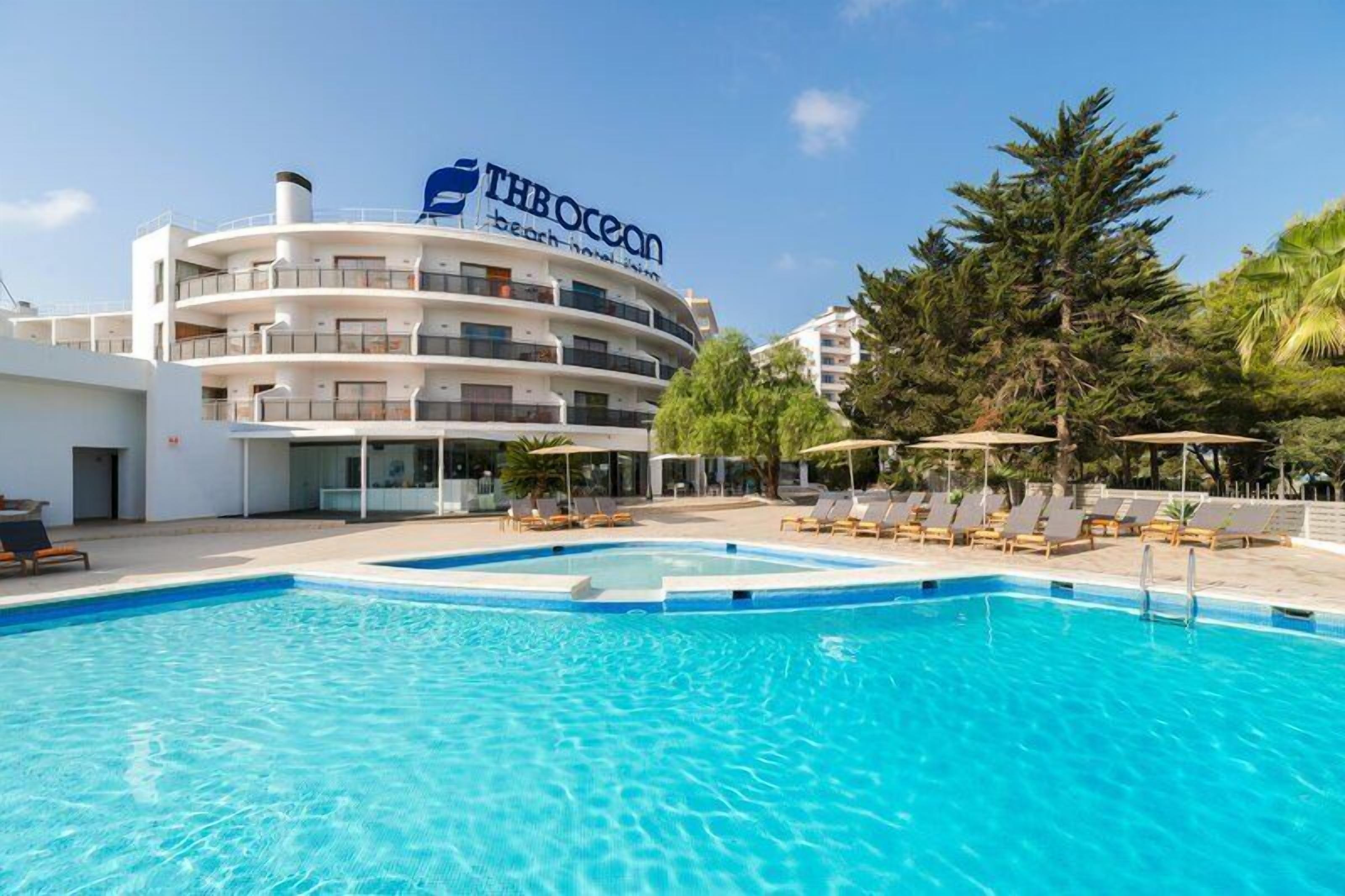 Outdoor pool, pool umbrellas, pool loungers