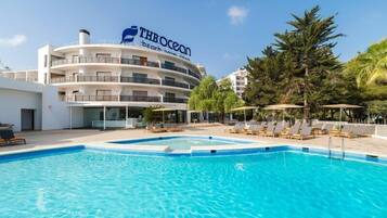 Outdoor pool, pool umbrellas, pool loungers