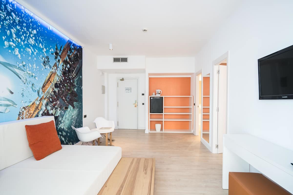 Junior Suite, Balcony | In-room safe, free WiFi, bed sheets