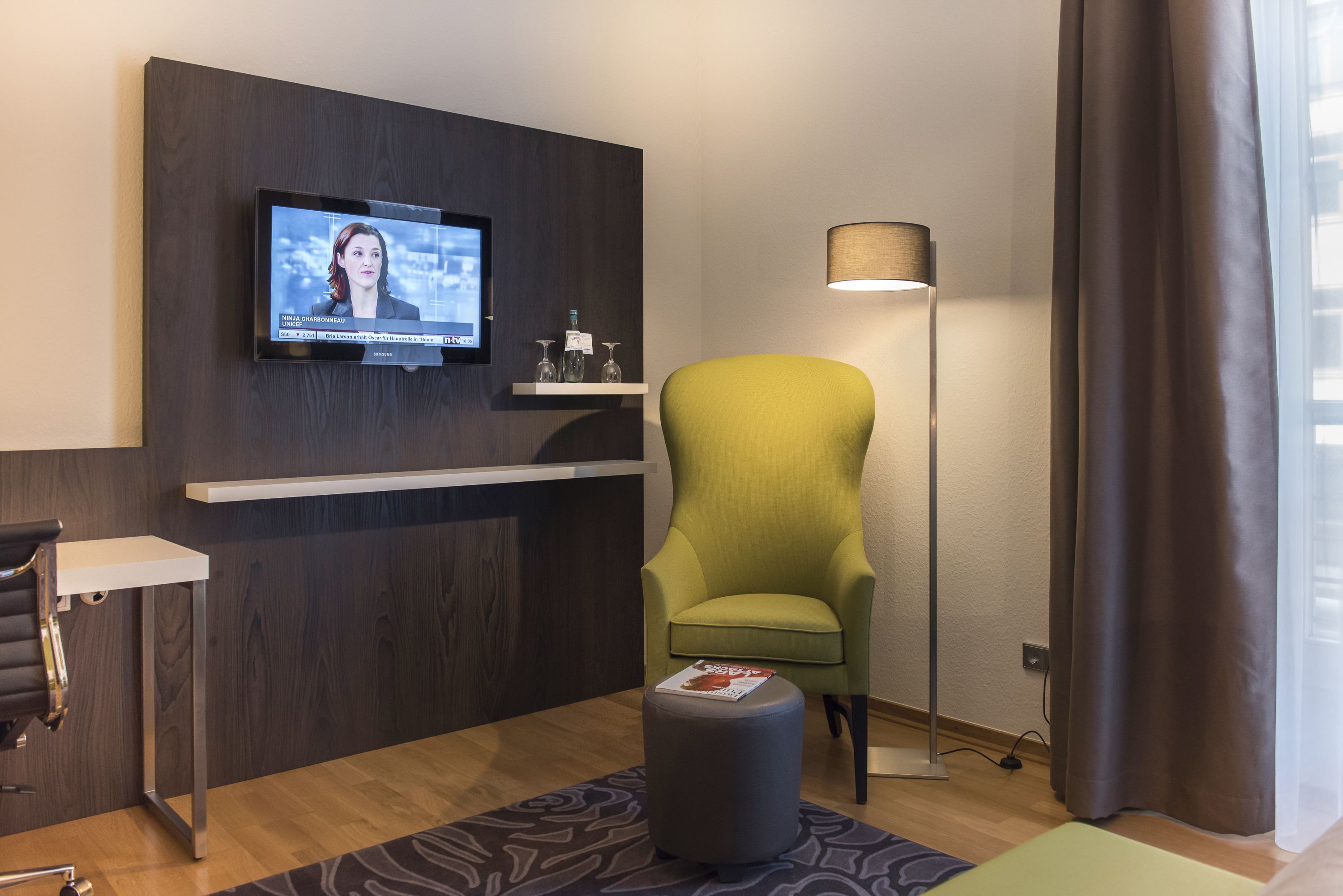 superior room | living area | lcd tv, first-run films, heated floors