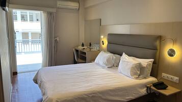Quadruple Room | Premium bedding, minibar, in-room safe, individually furnished
