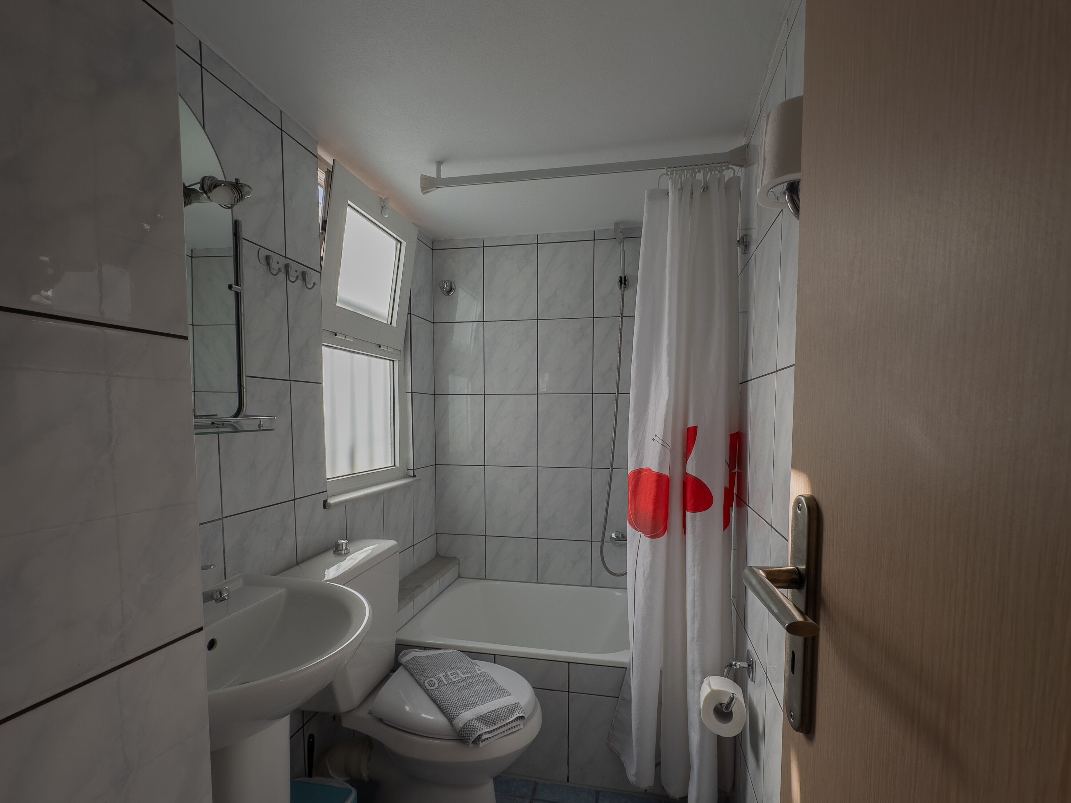 quadruple room | bathroom | shower, hair dryer, towels