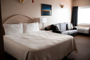 Basic Single Room, 1 King Bed | In-room safe, individually decorated, individually furnished, desk - West Bank Inn (Celina)