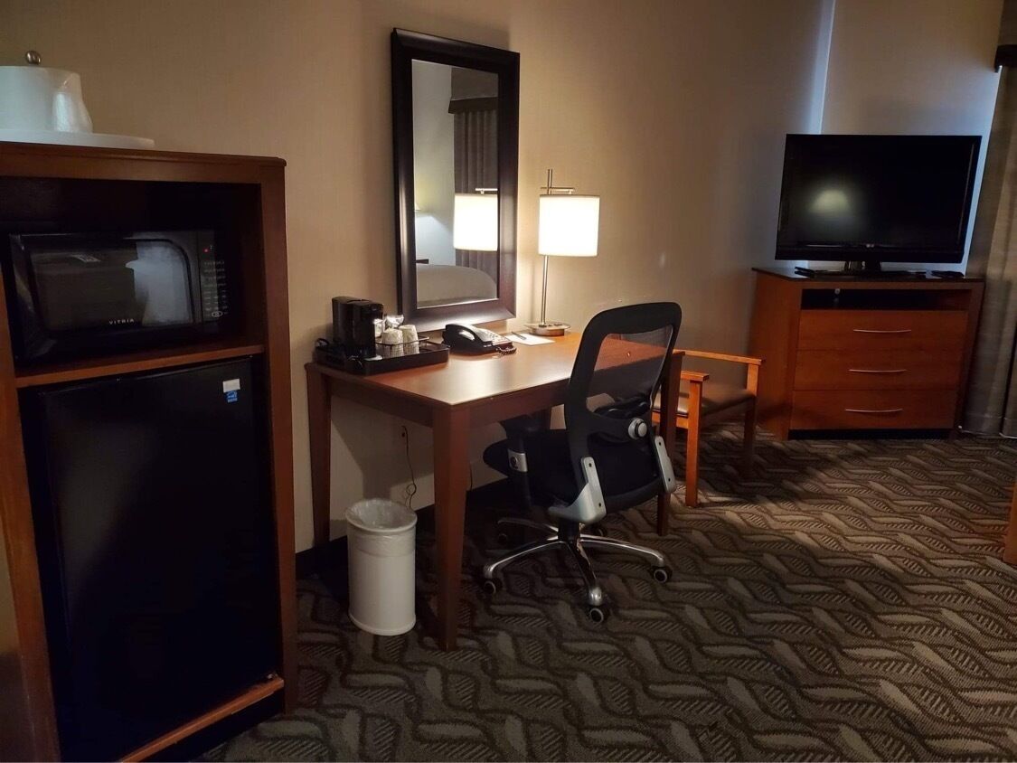 suite, 1 king bed, non smoking, jetted tub | in-room safe, iron/ironing board, free wifi, alarm clocks