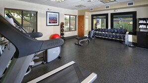 A gym with treadmills, dumbbells, and exercise equipment. - Hampton Inn & Suites Tucson East/Williams Center (Tucson)
