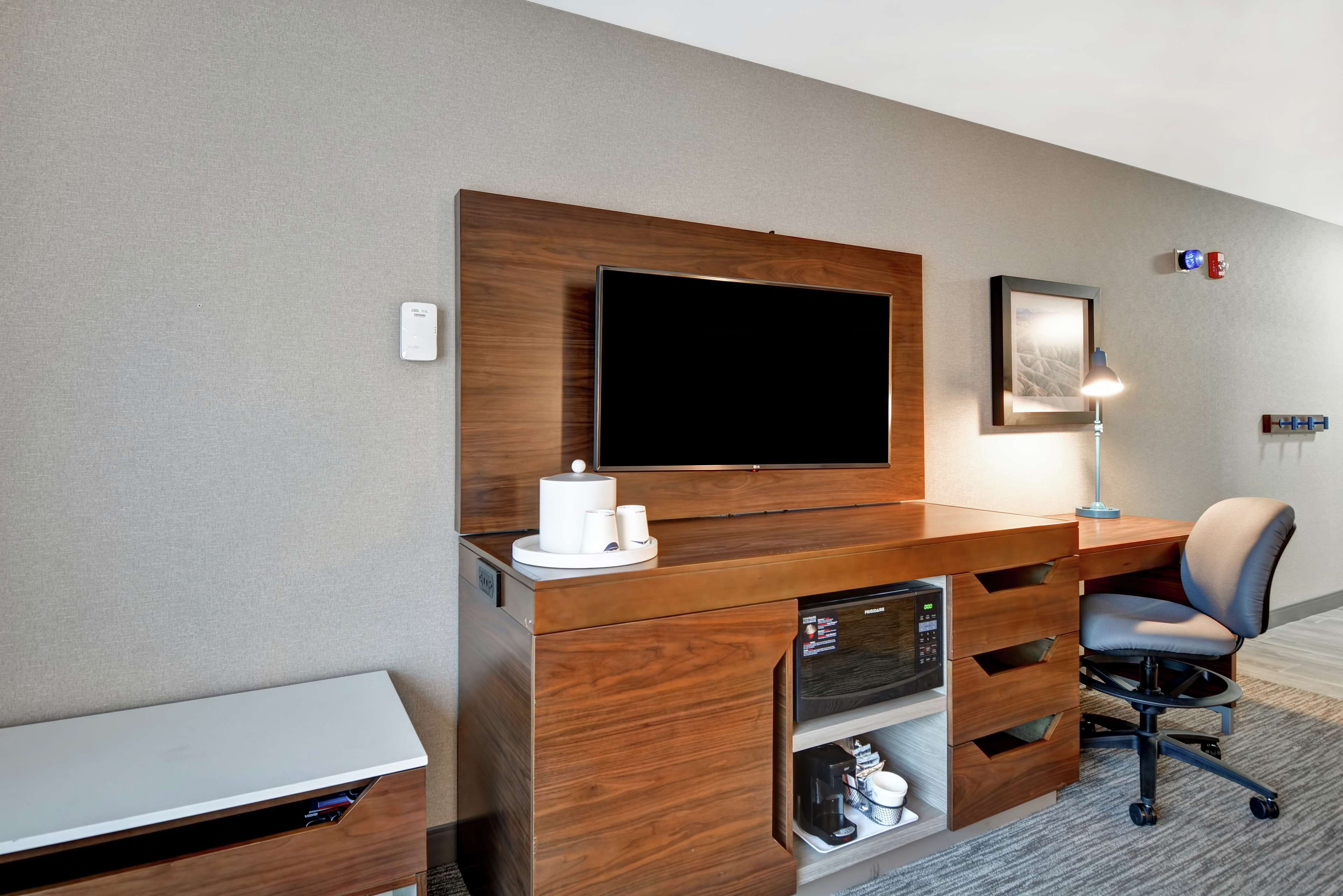 desk, laptop workspace, blackout curtains, iron/ironing board