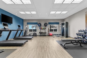 A gym with treadmills, weights, and exercise balls. - Hampton Inn & Suites El Paso West (El Paso)