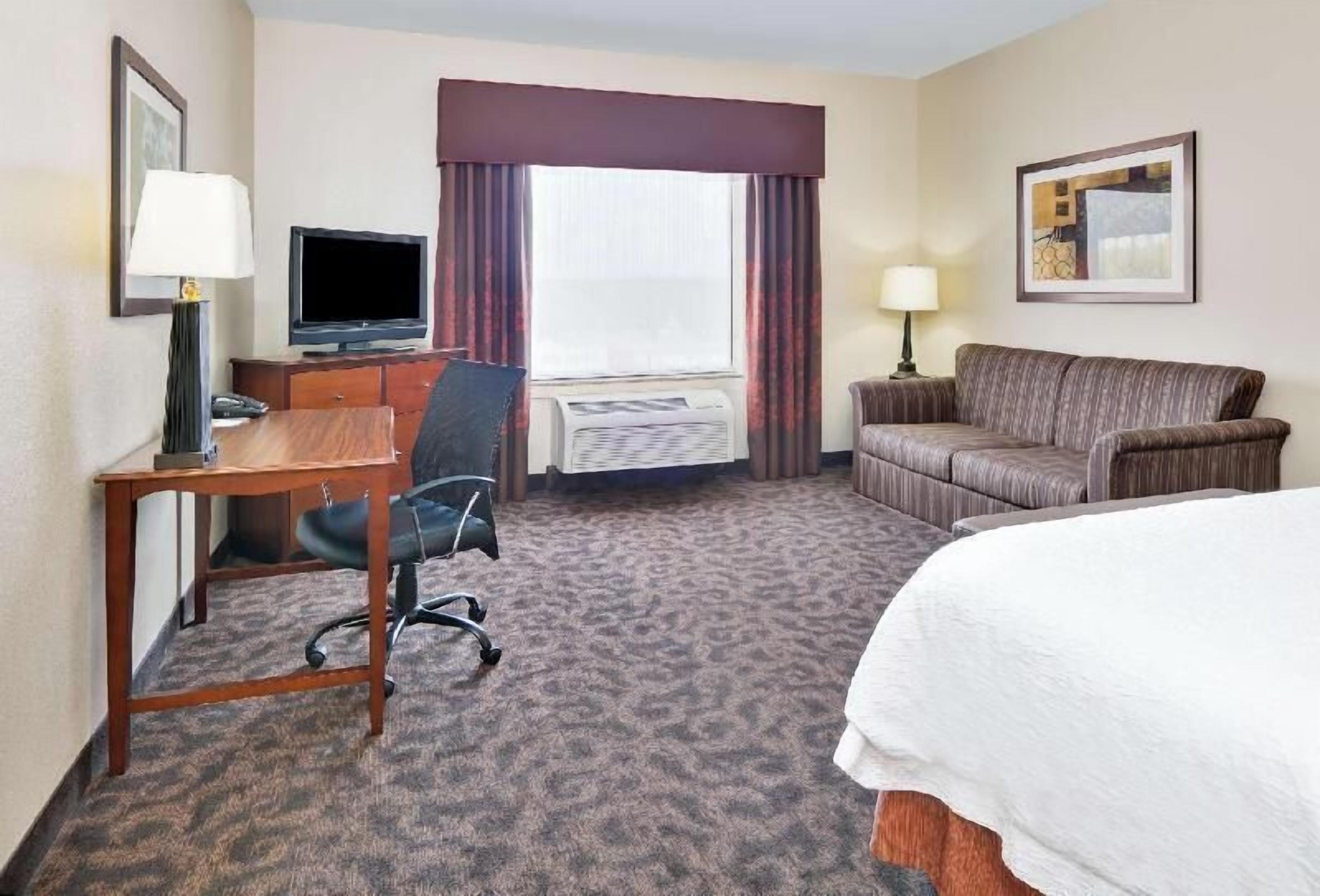 Hypo-allergenic bedding, desk, laptop workspace, iron/ironing board