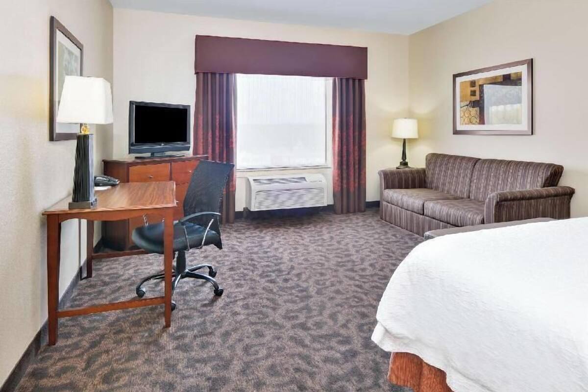 Hypo-allergenic bedding, desk, laptop workspace, iron/ironing board
