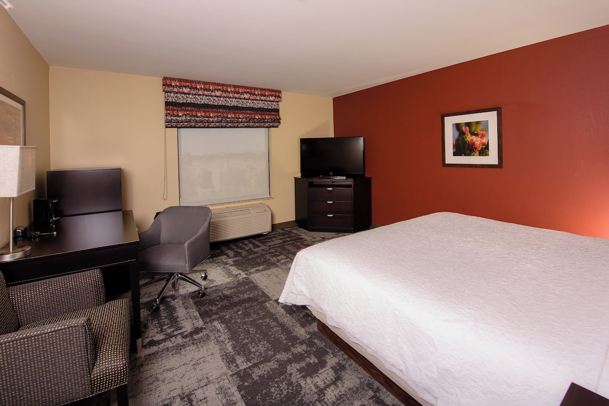 Premium bedding, blackout curtains, iron/ironing board
