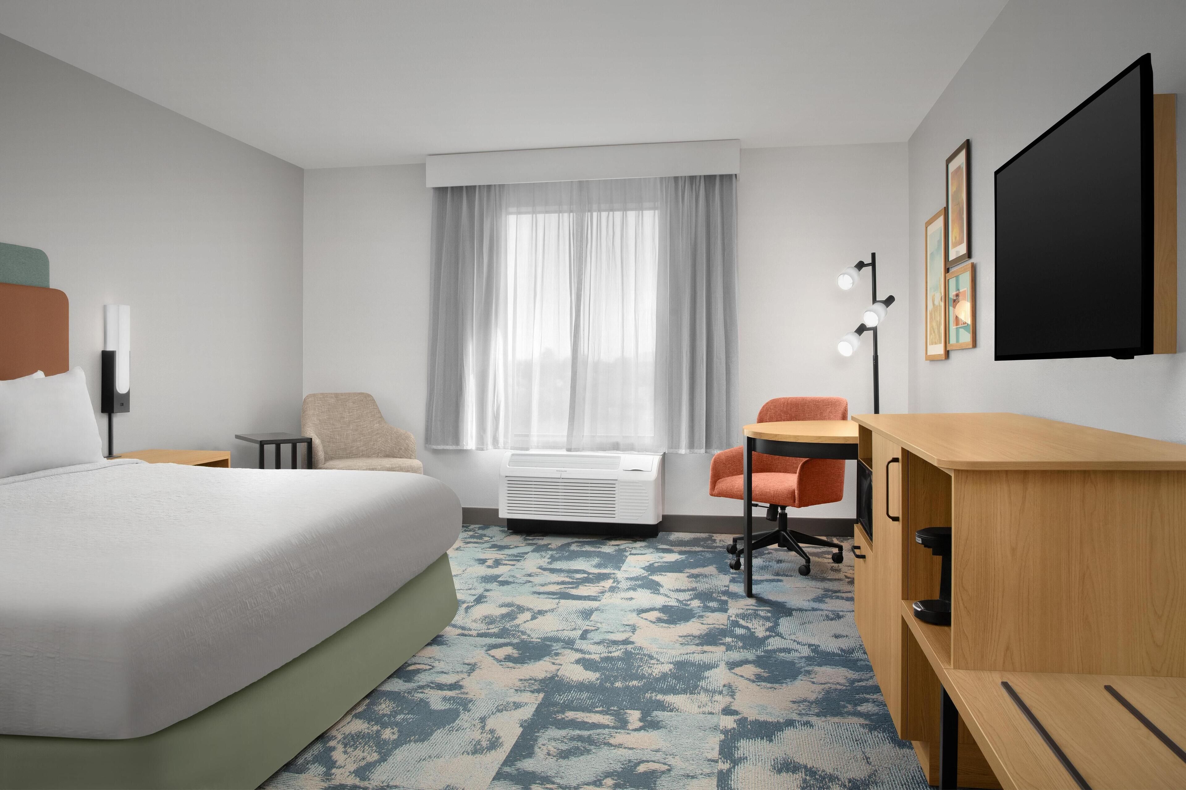 Premium bedding, blackout curtains, iron/ironing board