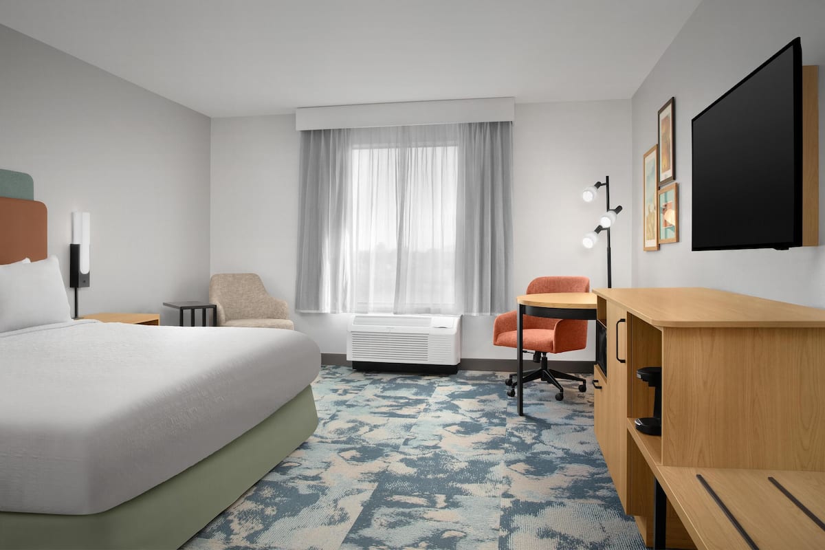 Premium bedding, blackout drapes, iron/ironing board