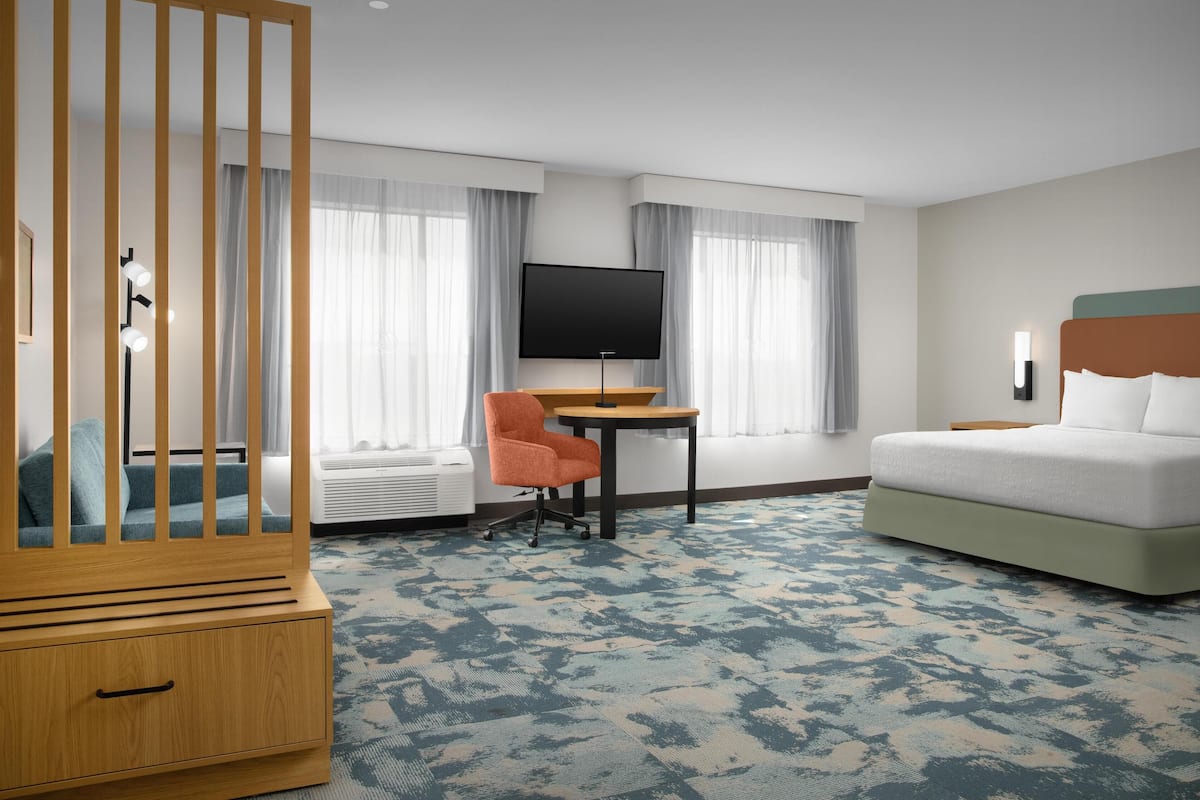 Suite, 1 King Bed, Accessible, Non Smoking (Mobility & Hearing, Roll-in Shower) | Premium bedding, blackout drapes, iron/ironing board