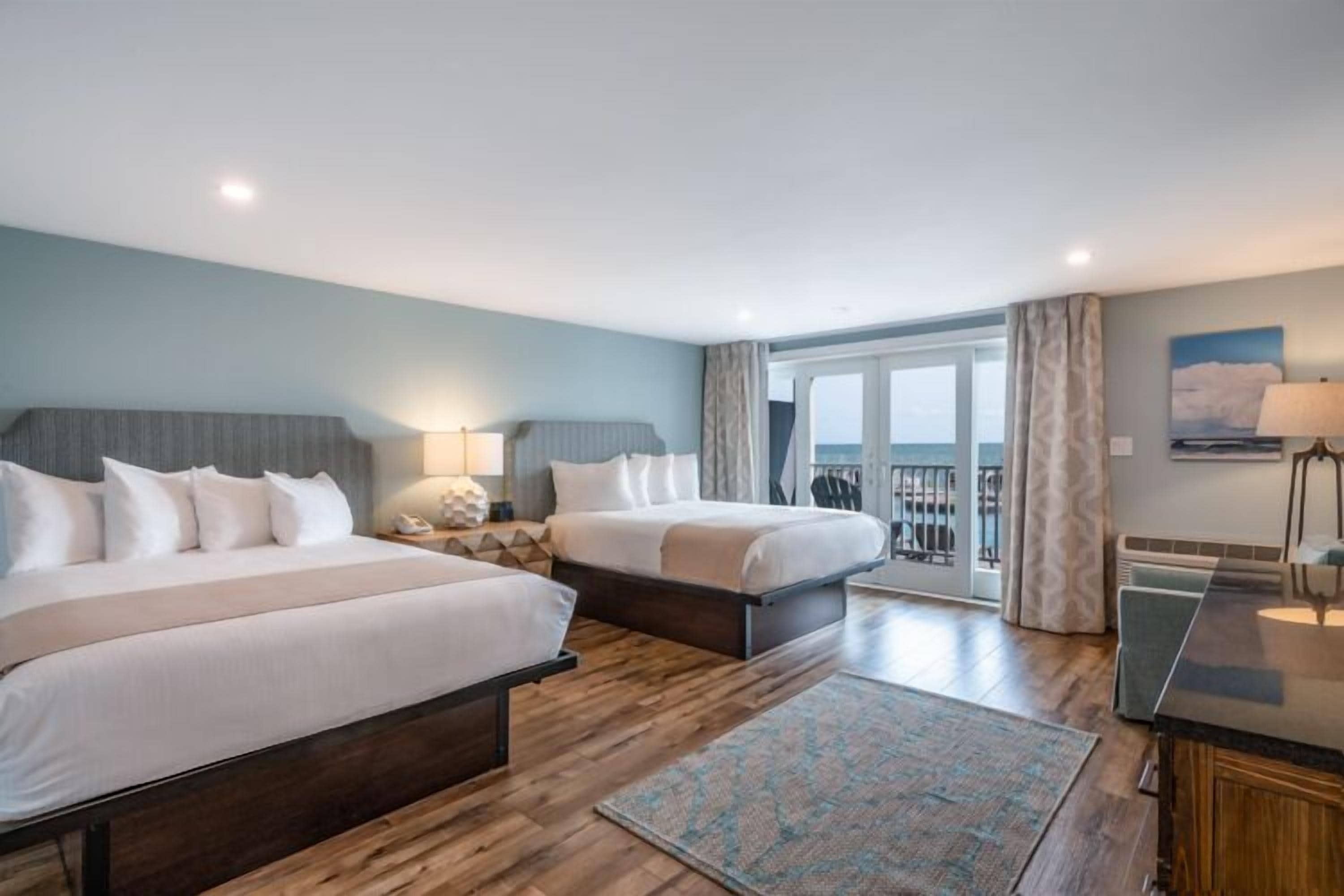 deluxe room, 2 queen beds, balcony, ocean view (queen) | premium bedding, blackout curtains, iron/ironing board