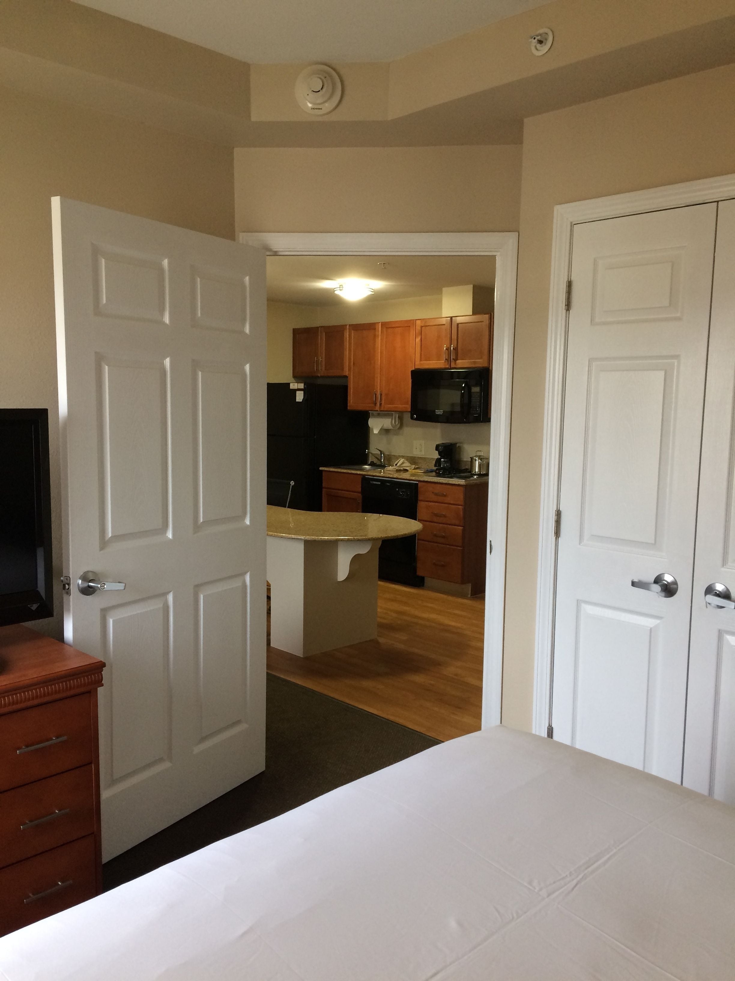 suite, 1 bedroom, kitchen (living and dining areas) | desk, blackout curtains, soundproofing, iron/ironing board