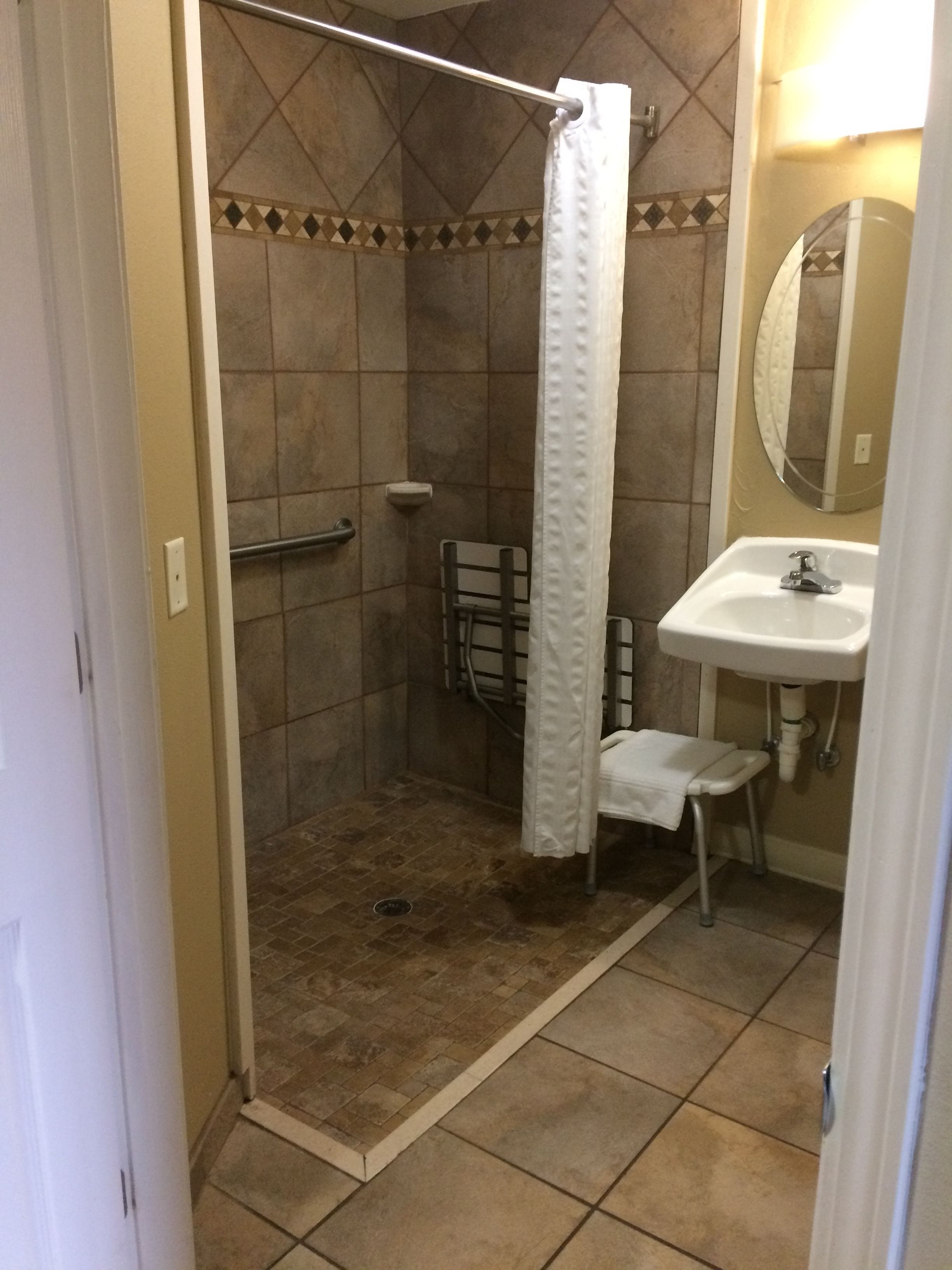 studio suite, 2 queen beds, accessible (mobility roll-in shower) | bathroom | combined shower/bathtub, free toiletries, hair dryer, towels