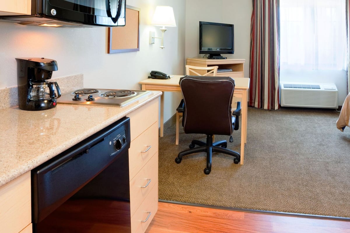 Desk, blackout drapes, soundproofing, iron/ironing board