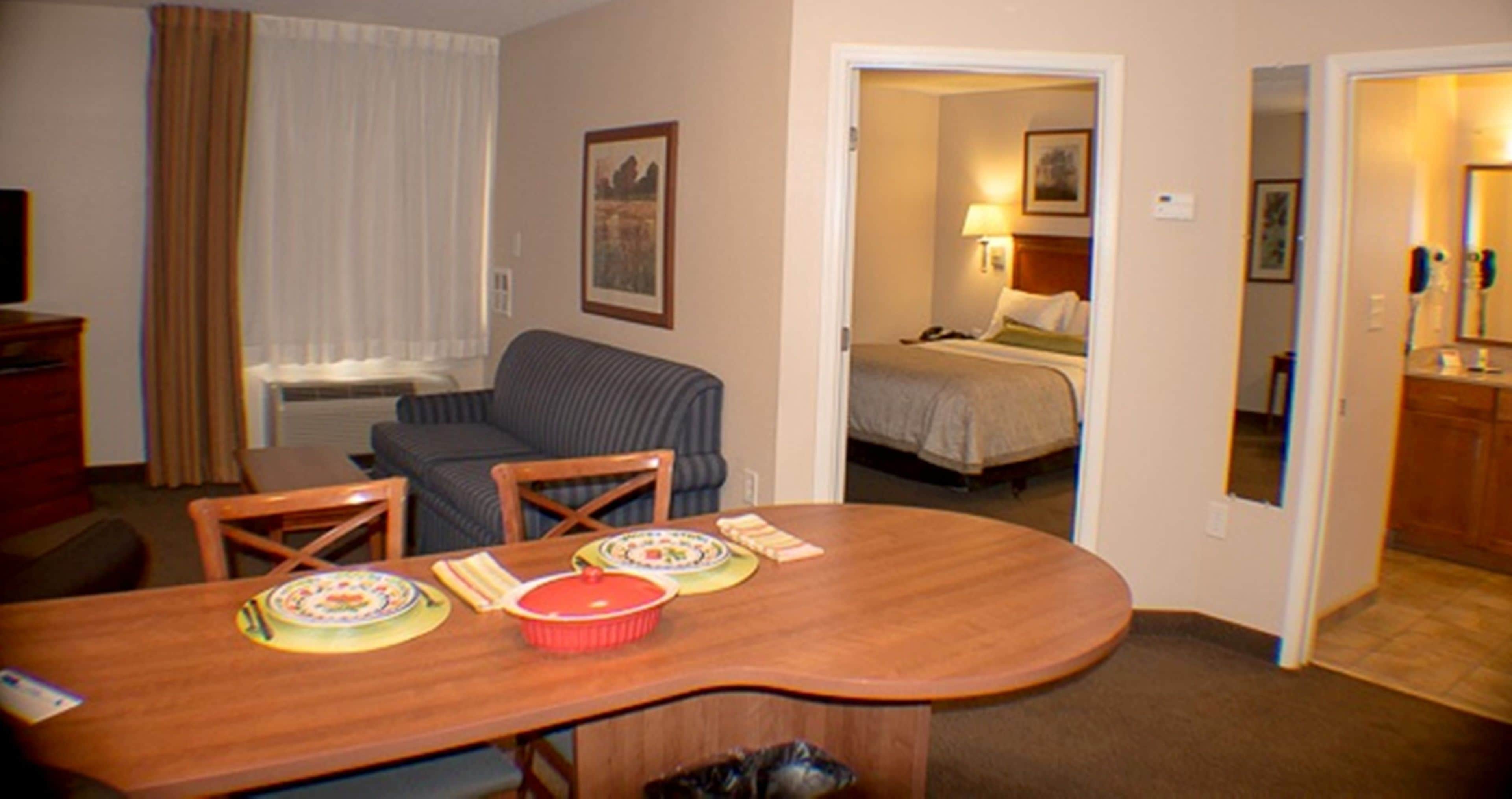 suite, 1 bedroom, kitchen (living and dining areas) | desk, blackout curtains, soundproofing, iron/ironing board