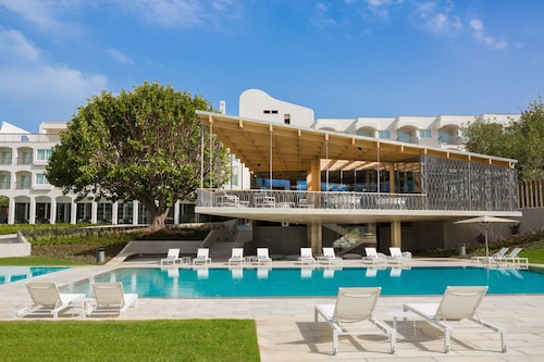 Ozadi Tavira Hotel