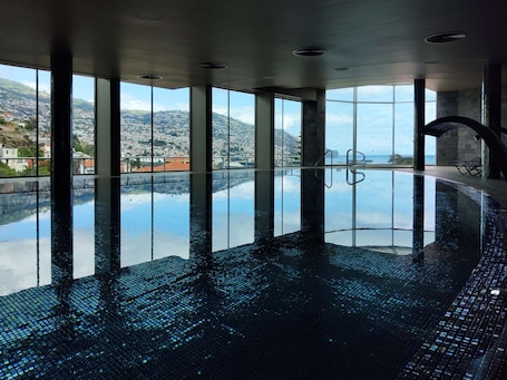 Indoor pool, outdoor pool, pool umbrellas, sun loungers