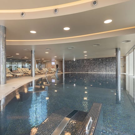 Indoor pool, outdoor pool, pool umbrellas, sun loungers