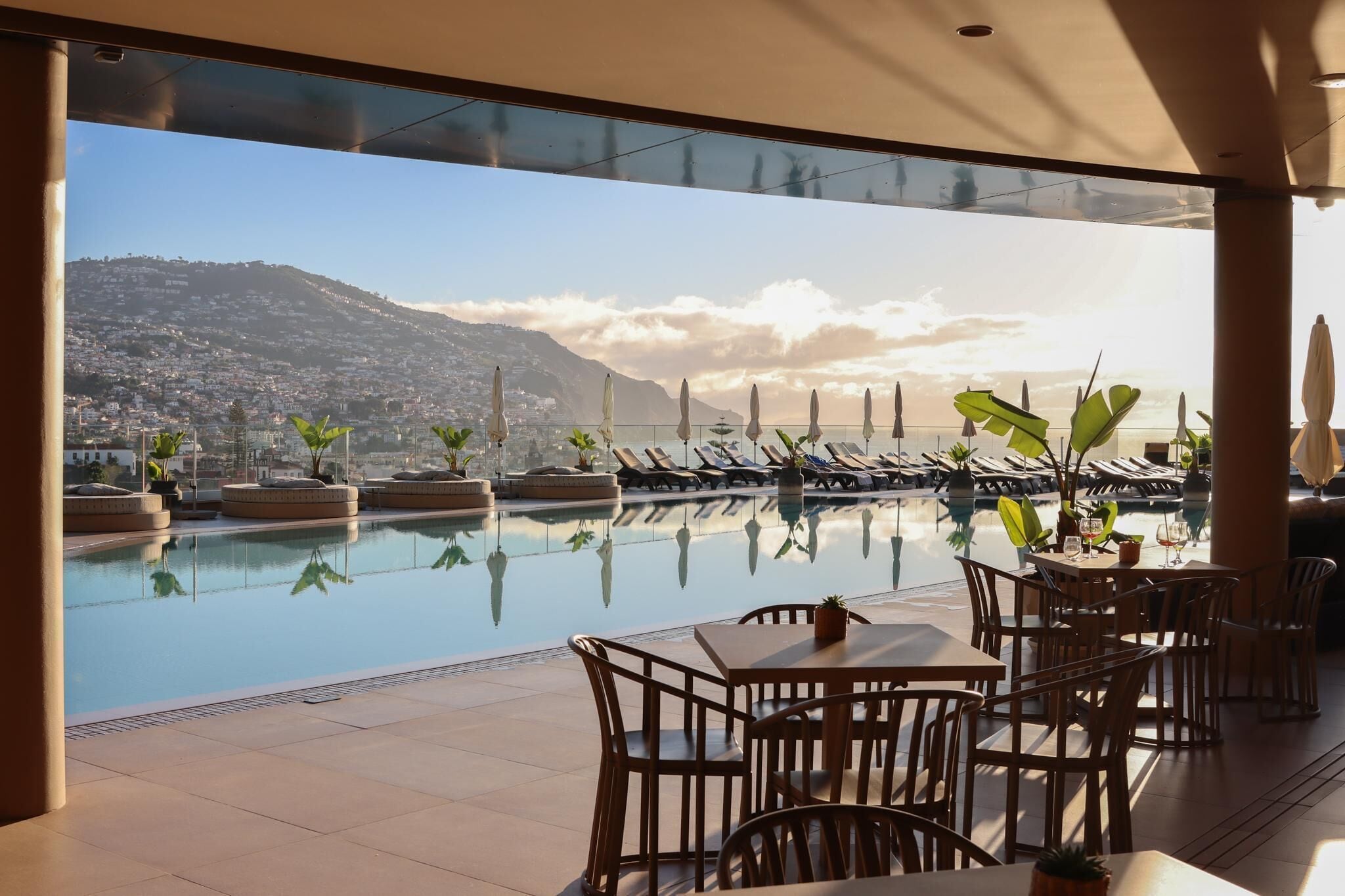 Indoor pool, outdoor pool, pool umbrellas, sun loungers