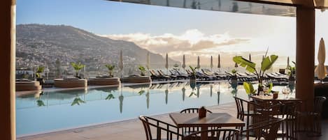 Indoor pool, outdoor pool, pool umbrellas, sun loungers