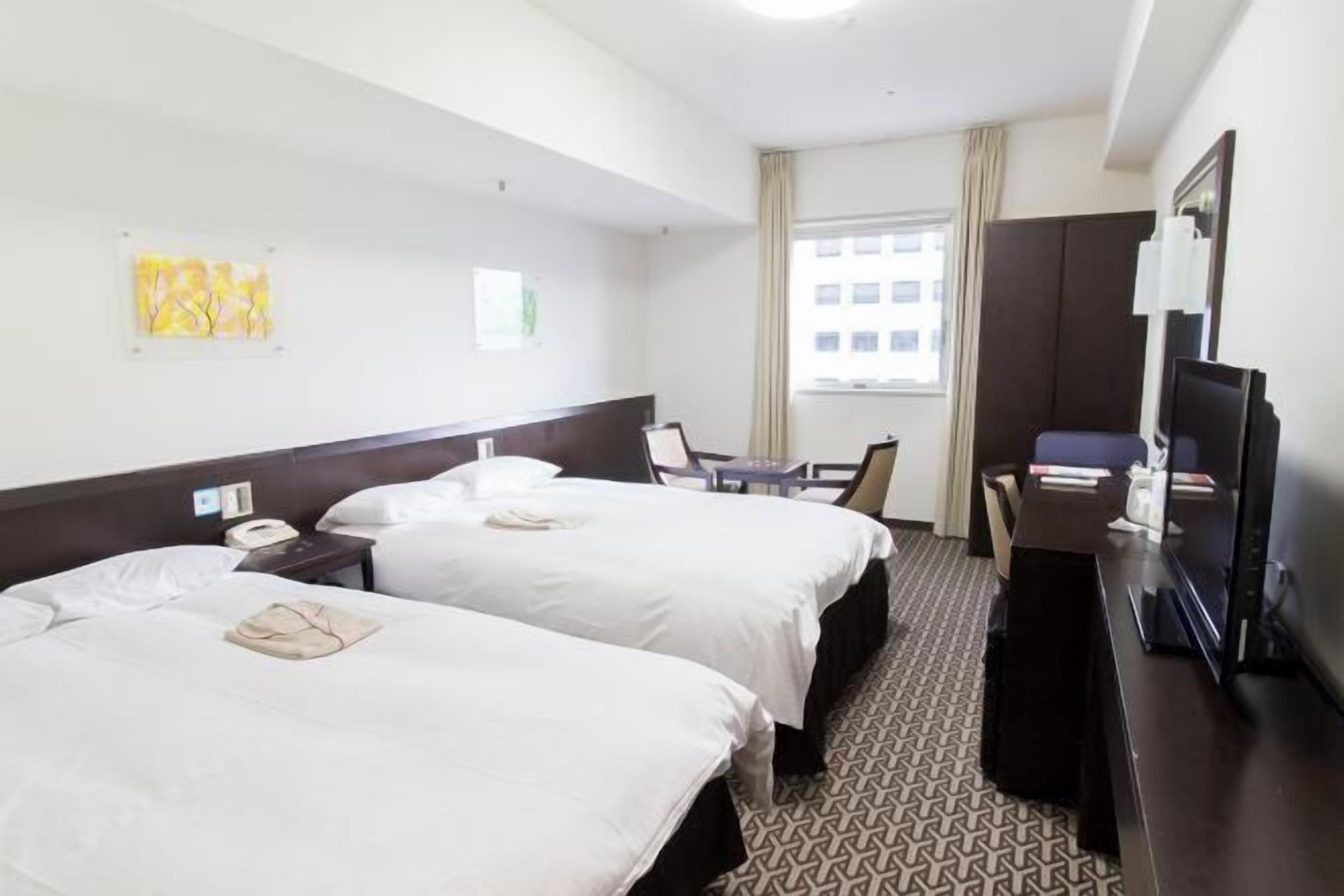 Premium bedding, desk, blackout drapes, iron/ironing board