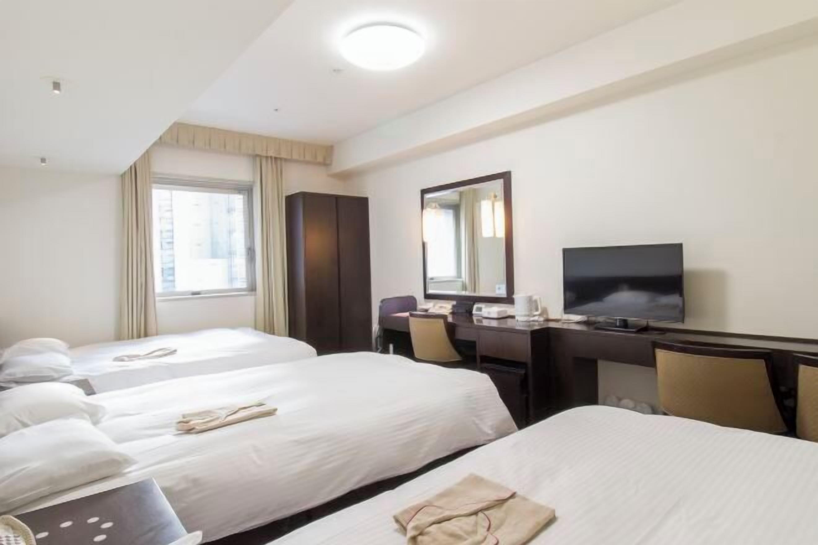 Premium bedding, desk, blackout drapes, iron/ironing board