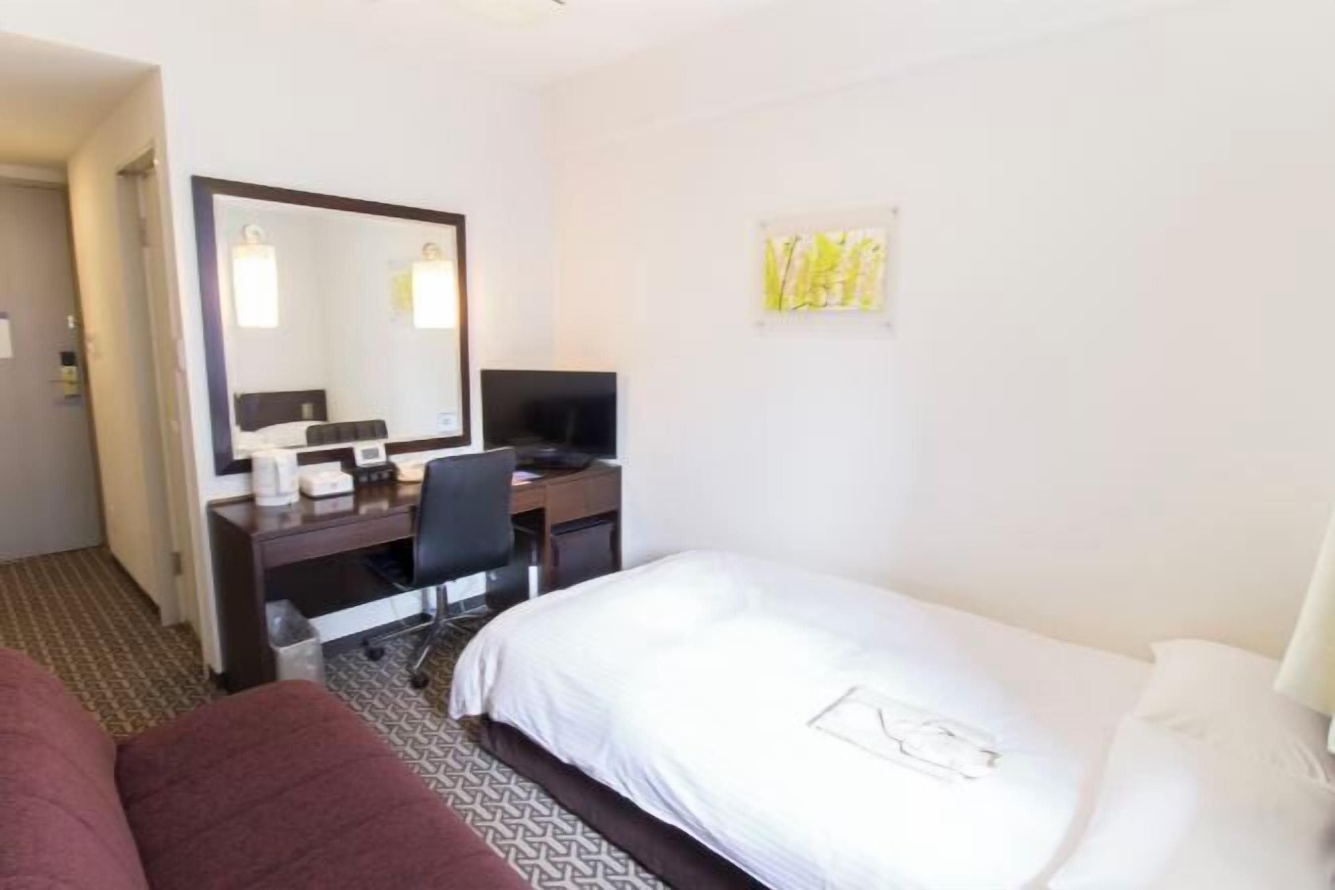 Premium bedding, desk, blackout drapes, iron/ironing board