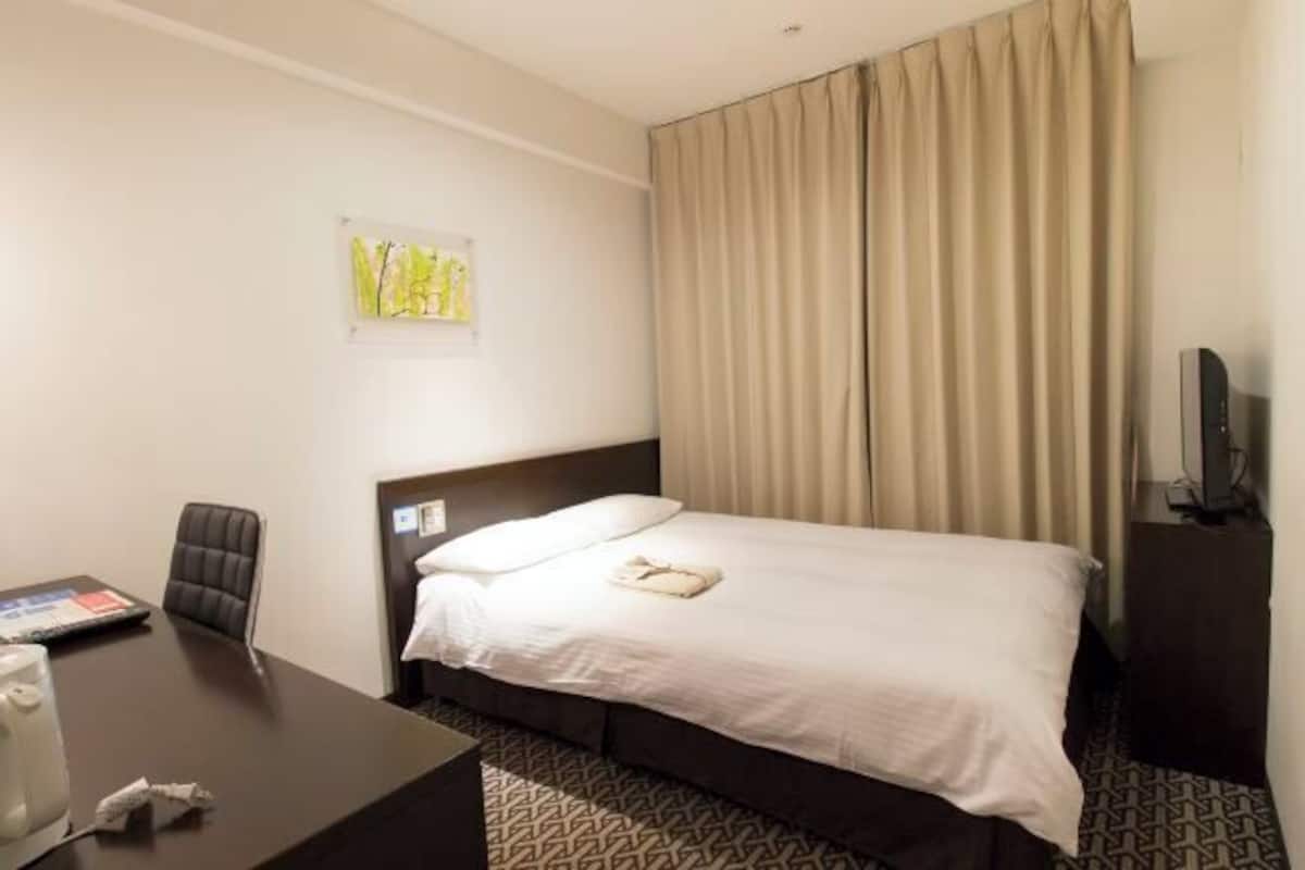 Premium bedding, desk, blackout curtains, iron/ironing board