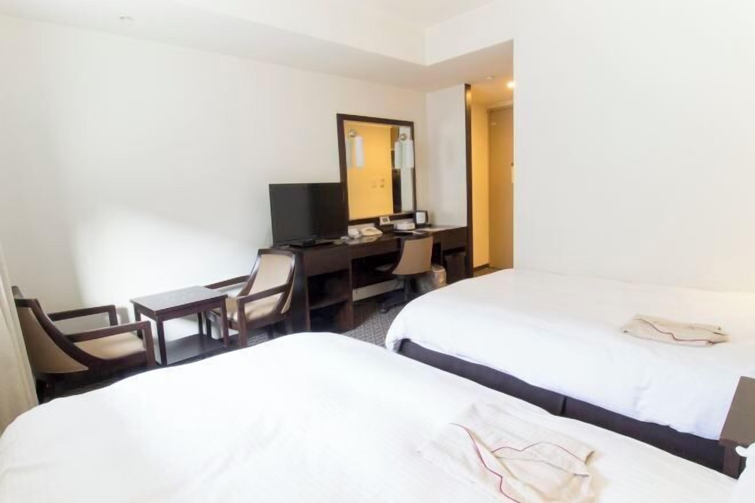 Premium bedding, desk, blackout drapes, iron/ironing board