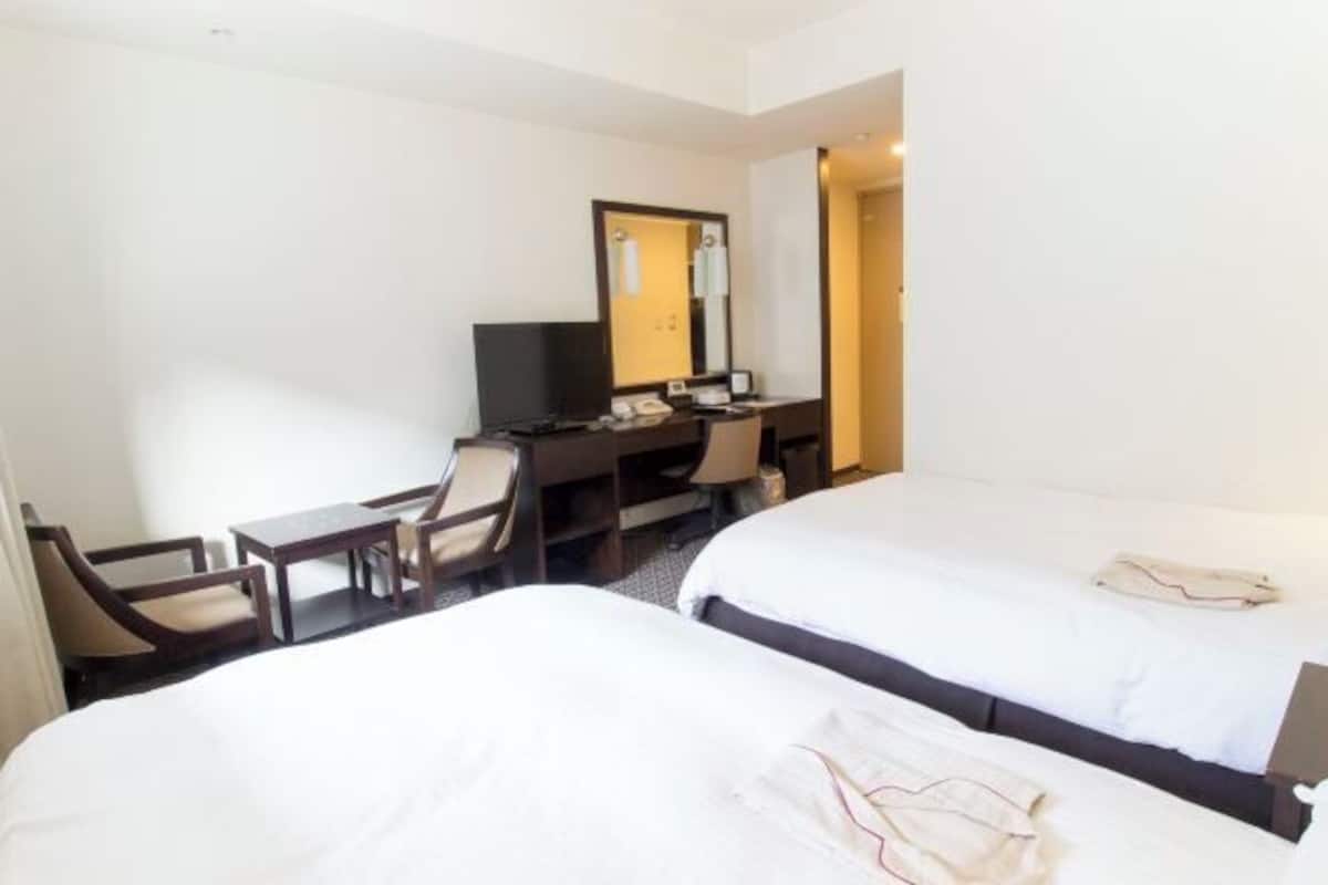 Premium bedding, desk, blackout curtains, iron/ironing board