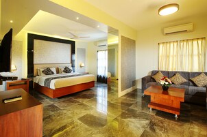 Suite, 1 King Bed | Minibar, in-room safe, individually furnished, rollaway beds