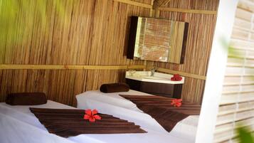 Experience a warm and elegant retreat with two beds, a self-service bathroom, and a wooden bench.