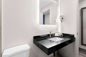 Suite, 1 King Bed, Non Smoking, Jetted Tub | Bathroom | Free toiletries, hair dryer, towels, soap