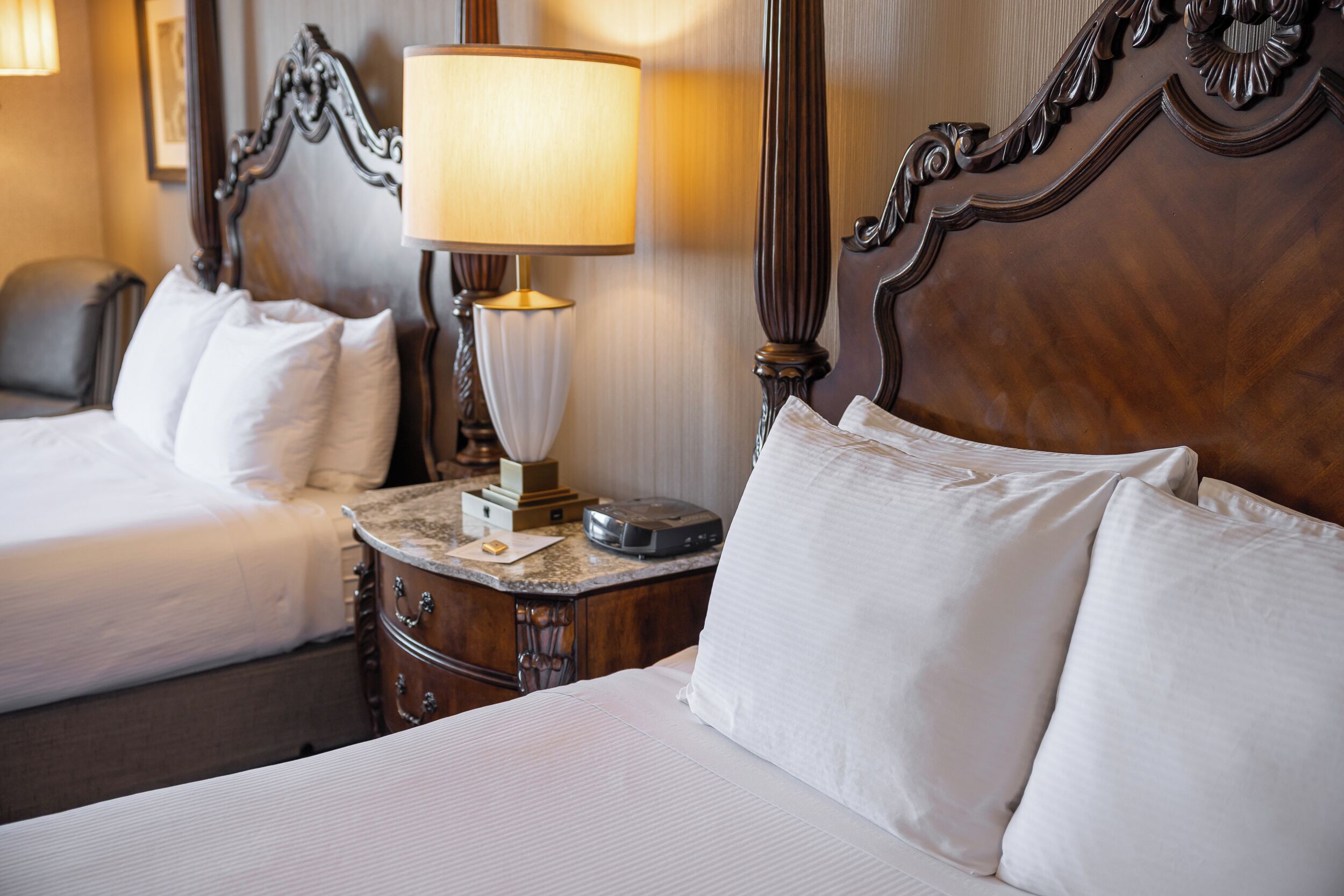 deluxe room, 2 queen beds, bathtub, garden view | desk, laptop workspace, blackout curtains, iron/ironing board