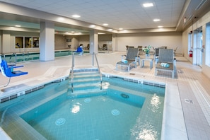 Indoor pool, open 6:00 AM to 11:00 PM, pool loungers