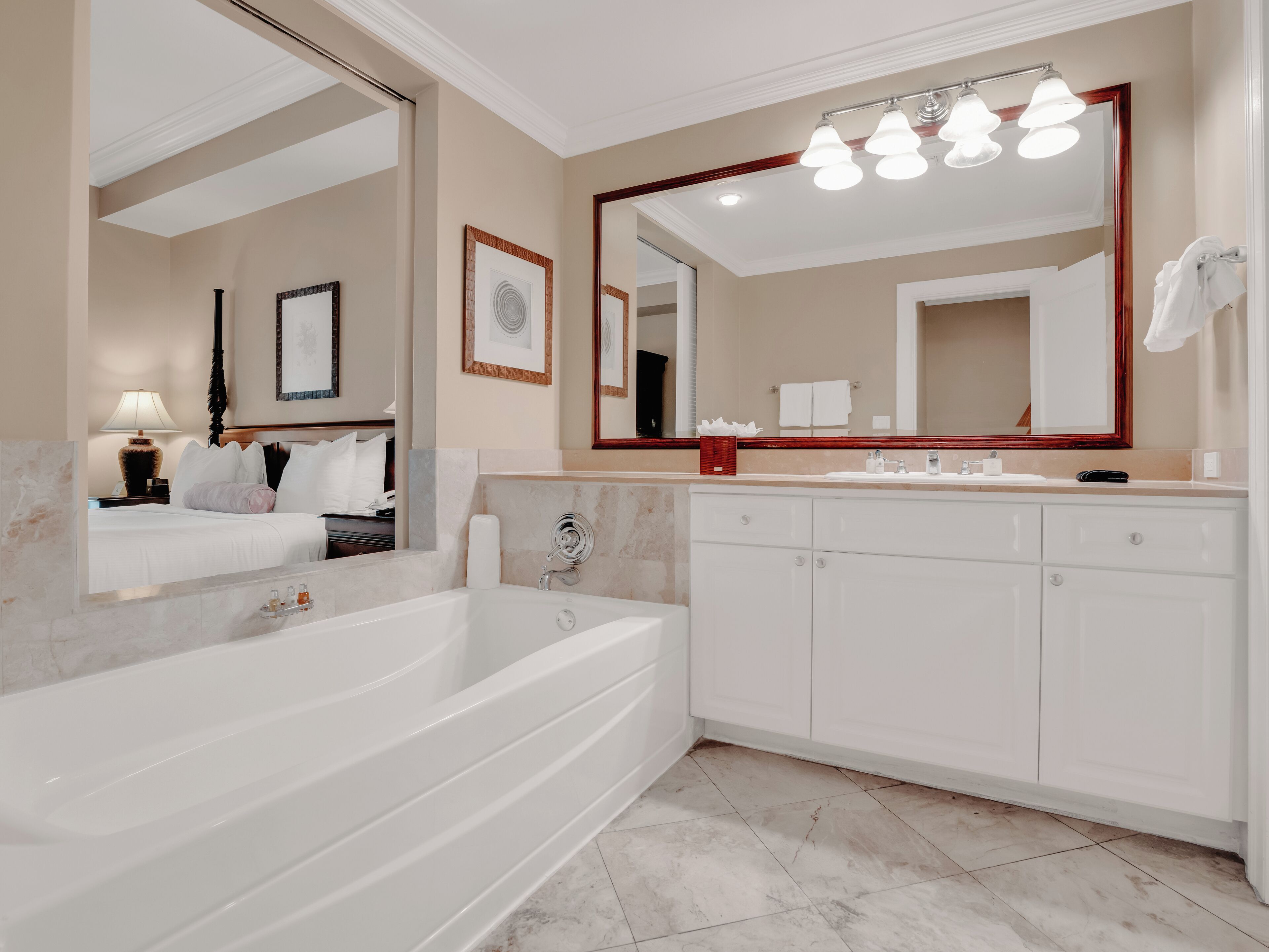 luxury junior suite | bathroom | free toiletries, hair dryer, bathrobes, towels