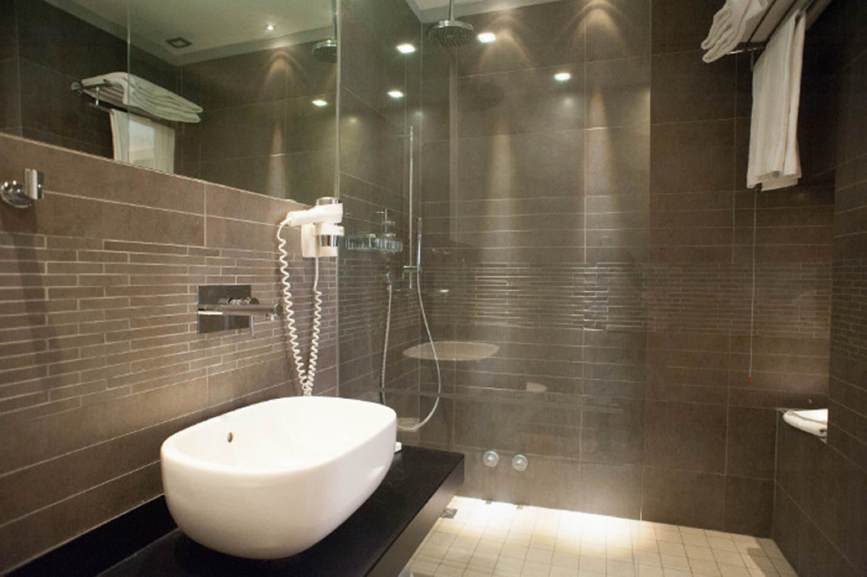 standard double room | bathroom | hair dryer, slippers, towels