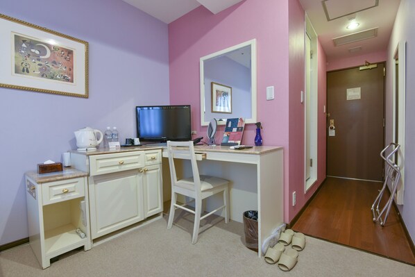 A room with a desk, chair, television, and a mirror. - New Osaka Hotel Shinsaibashi (Osaka)