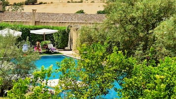 Seasonal outdoor pool, pool umbrellas, sun loungers