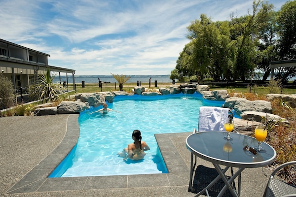 2 outdoor pools, open 8 AM to 9:00 PM, pool umbrellas, pool loungers