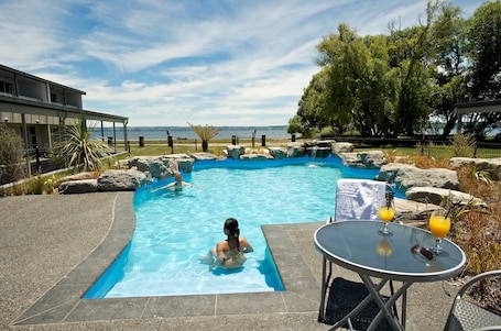 2 outdoor pools, open 8 AM to 9:00 PM, pool umbrellas, sun loungers