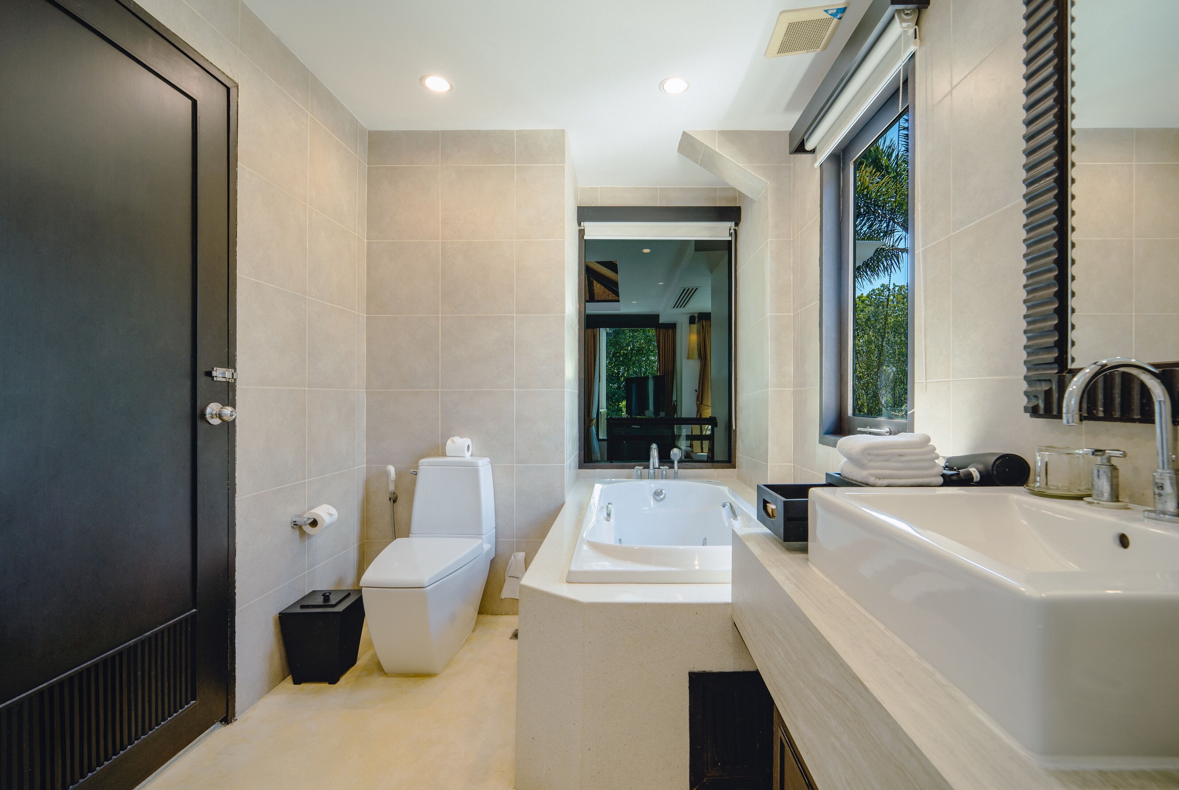 two-bedroom presidential pool villa | bathroom | separate bathtub and shower, deep-soaking bathtub, rainfall showerhead